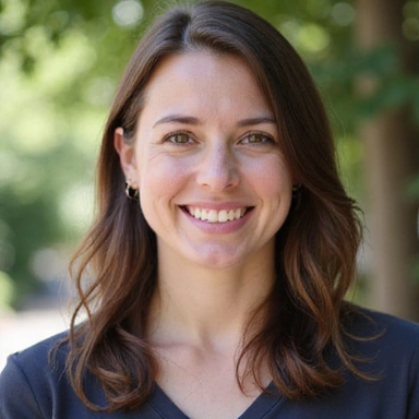Professional portrait of a certified holistic nutritionist, Jane Doe, with a warm and approachable smile.